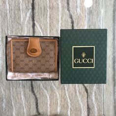 Gucci Vintage Never Used Wallet! 100% Authentic Gucci Brown Wallet With Card Slots, Gucci Brown Formal Wallet, Formal Brown Gucci Wallet, Classic Gucci Wallets With Card Slots, Gucci Bifold Wallet Gift, Gucci Bifold Wallet For Everyday Use, Gucci Bifold Wallet For Formal Occasions, Classic Gucci Bifold Wallet, Gucci Rectangular Wallet With Coin Pocket