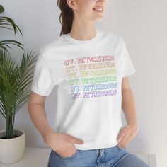 Celebrate self-expression with this vibrant and colorful St. Pete Pride t-shirt! This lightweight and comfortable shirt is made from 100% cotton fabric, and it's a great choice for any season. Perfect for St. Pete pride events, it will make sure you stand out from the crowd and make a statement this Pride Month – order your St. Pete Pride Tee today! • T-SHIRT QUALITY:100% airlume combed and ringspun cotton with ribbed knit collars to bolster shaping and taping at the shoulders for a better fit w Pride Tees, Pride Tshirts, Pride Month, Black Tee, Ribbed Knit, Screen Printing, Print Quality, Cotton Fabric, Unique Designs