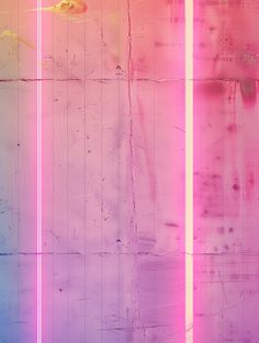 an abstract painting with two vertical lines in pink and blue, against a white background