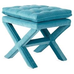 a blue stool that is sitting on top of it