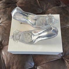 Brand New Crystal Accent Heels Size 8 Never Worn Elegant Clear Heels With Branded Heel Counter, Formal Clear Heels With Branded Heel Counter, Clear Pointed Toe Heels For Formal Occasions, Formal Clear Pointed Toe Heels, Elegant Clear Closed Toe Heels, Elegant Clear Heels With Round Toe, Elegant Clear 4-inch Heels, Elegant 4-inch Clear Heels, Cinderella Heels