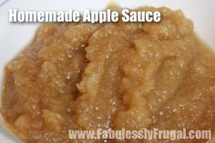 homemade apple sauce in a white bowl with the words homemade apple sauce above it and below