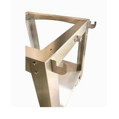 a metal frame with two brackets attached to the back of it, against a white background