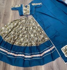 Blue Chaniya Choli for Navratri Patola Lehenga 3 pc Readymade garba Lehenga Festival outfit Garba Night lengha ready to wear Dress 🌷Wedding Collection 2025🌷 Fusion of Plain & Printed for Wedding!  Lehenga(Stitched) Lehenga Fabric : Dola Silk And Rayon Lehenga Work : Printed With Foil Work And Lace Touch Up Lehenga Waist : SUPPORTED UP TO 42 Lehenga Closer : Drawstring With Heavy Tassels and Zip Stitching : Stitched With Canvas and attached with Can Can Length : 41 Flair : 4.50 Meter  Inner : Micro Cotton Blouse (Stitched) Blouse fabric : Dola Silk And Rayon  Blouse Work : Printed And Foil Work With Cowrie (Kodi) Lace Touch Up Blouse Size : 38" There is Extra Margin Customer Can Adjust Up to 42 Blouse Length : 15 Sleeve Length : 11 Dupatta Dupatta Fabric : Rayon Dupatta Work : Plain And P Anarkali Sets With Dori Work For Navratri, Art Silk Traditional Wear For Navratri, Art Silk Sets With Cutdana For Navratri, Traditional Drape Sets With Zari Work For Navratri, Art Silk Cutdana Sets For Navratri, Navratri Multicolor Art Silk Palazzo Set, Navratri Art Silk Sets With Cutdana, Semi-stitched Cotton Floor-length Sets, Designer Bandhani Print Palazzo Set For Navratri