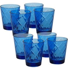 set of six blue glass tumblers with diamond design on each one side and bottom