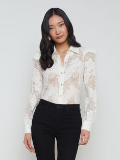 The Jenica blouse makes a stunning statement in intricate floral lace. • Soft cotton-blend lace• Long sleeves• Lightly padded puff shoulders• Scalloped hem • Unlined• 1-button cuffs• Front button closure | L'AGENCE Jenica Lace Blouse Top In Lace Ivory Lace Weave, Lace Button, Ivory Lace, Lace Blouse, Sweater Skirt, Blazer Dress, Sweater And Shorts, Long Sleeve Lace, Jeans Dress