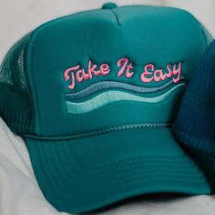 Searching for a relaxed and comfortable hat to take on your next adventure? Look no further than the Take It Easy Foam Trucker Hat! Perfect for the lake. The foam trucker hat is perfect for keeping you cool all day in hot weather. 65% cotton, 35% polyester machine wash delicate or hand wash one size fits most adjustable back mesh netting snapback closure Katydid Wholesale offers an unbeatable selection of wholesale hats and t-shirts for all occasions. Our wholesale hats feature over 1000 varieti Trendy Trucker Hat For Summer Outdoor Activities, Trendy Summer Baseball Cap For Outdoor Activities, Curved Bill Baseball Cap For Summer Camping, Blue Trucker Hat For Outdoor Activities, Lightweight Snapback Trucker Hat For Outdoor, Trendy Trucker Hat For Outdoor Events, Trendy One Size Fits Most Trucker Hat For Outdoor, Summer Trucker Hat For Camping, Trendy Trucker Hat For Outdoor Activities