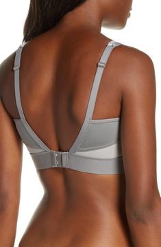 With the support of two sports bras in one, this lightweight style that wicks away moisture is perfect for cardio or running. Memory-foam straps and a wide elastic bottom band help the design stay put while mesh cutouts give you breathable comfort. Light foam cups give shape and projection Underwire 85% CoolMax® polyester, 15% Lycra® spandex Hand wash, line dry Imported Lingerie Gray Nylon Sports Bra For Sports, Gray Nylon Sports Bra, Breathable Gray Nylon Sports Bra, Gray Compression Sports Bra In Nylon, Gray Compression Nylon Sports Bra, Gray Nylon Sports Bra With Light Support, Gray Nylon Sports Bra For Gym, Micro-elastic Sports Bra With Adjustable Straps, Sports Bra With Adjustable Straps And Micro-elastic Fit