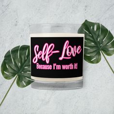 a candle that reads self love because i'm worth it