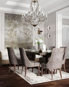 a dining room table with chairs and a chandelier