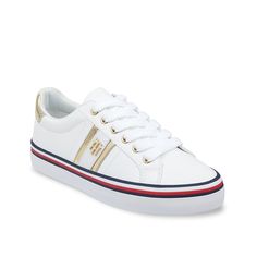 Tommy Hilfiger-Fentii Sneaker Your weekend look can earn extra oomph with the Tommy Hilfiger Fentii sneaker. Metallic highlights and a striped midsole create an inviting look to the round-toe sneaker, backed by a wavy leather sole. Tommy Hilfiger Sneakers With White Sole For Sports, White Casual Tommy Hilfiger Sneakers, Tommy Hilfiger Sporty Synthetic Sneakers, White Leather Tommy Hilfiger Sneakers, Tommy Hilfiger White Cushioned Sneakers, Round Toe Sneakers, Sneaker Shopping, Sneakers White, Tommy Hilfiger