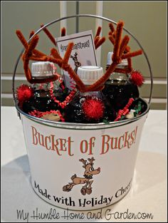 a bucket filled with holiday cheerios on top of a table