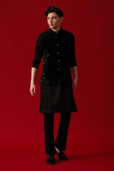 Black sleeveless velvet bundi with metallic nalki flora pattern and band collar neckline. Paired with full sleeves kurta in glaze cotton base and trouser crafted in japanese polyester base.
Components: 3
Pattern: Embroidery
Type Of Work: Metallic Nalki
Neckline: Band Collar
Sleeve Type: Bundi: Sleeveless, Kurta: Full
Fabric: Bundi: Velvet, Kurta: Glaze Cotton, Trouser: Japanese Polyester
Color: Black
Occasion: Sangeet - Aza Fashions Kurta Set Men, Velvet Kurta, Sleeveless Kurta, Flora Pattern, Nehru Jacket, Pattern Embroidery, Band Collar, Kurta Set, Full Sleeves