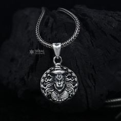 Metal-925sterling silver. Item type- Hanuman pendant Weight- 5.17grams. Length- 2.7cm, Width- 2.6cm Finish-Oxidized. chain width-1.5mm(if buy) Weight-12.500 to 18.500 grams(weight vari as per length) Chain type-screw chain. Traditional Sterling Silver Coin Pendant Jewelry, Traditional Sterling Silver Jewelry With Coin Pendant, Spiritual Silver Jewelry With Coin Pendant, Festival Jewelry With Coin Pendant, Stamped 925 Amulet Pendant Jewelry, Sterling Silver Round Pendant For Festivals, Sterling Silver Round Pendant Jewelry For Festivals, Sterling Silver Round Jewelry For Rituals, Temple Jewelry Engraved Round Pendant