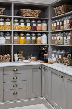 an organized pantry with lots of food in it