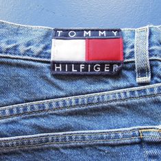 "Brand: Tommy Hilfiger Women's size 11 with a 30\" inseam 90's vintage large Tommy Hilfiger patch on back green zipper accent nice condition-just faded over time with light fraying along edges 33\" waist 12\" front rise 14\" back rise 30\" inseam 8\" across ankle" Casual Denim Bottoms With Logo Patch, Casual Bottoms With Straight Leg And Logo Patch, Casual Straight Leg Bottoms With Logo Patch, Casual Denim Blue Bottoms With Logo Patch, High Waist Mom Jeans, Light Weight Shoes, Tommy Hilfiger Jeans, Denim Branding, Personal Checks