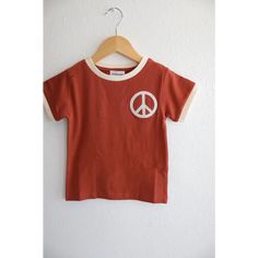 Not your basic everyday ringer tee, this retro-inspired shirt is a staple for any kiddo's collection. Chainstitch embroidered with a peace sign on the left chest, this lightweight and cozy neutral is perfect for all seasons.Here are some fun facts: Made with super soft 100% organic cotton fabric These run true to size. If your kiddo is usually a youth small, go ahead and order the size 6. if they're closer to the youth medium, a size 7 should be just right. Pre-shrunk for easy laundering individ Friends Sign, Ringer Tee, Retro Logo, Organic Cotton Fabric, Poly Bags, Grab Bags, Chain Stitch, Peace Sign, Auburn