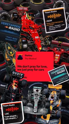 a red race car surrounded by lots of tires and stickers that say we don't pray for love, was just pray for cars