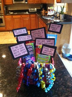 a basket filled with lots of candy sitting on top of a counter