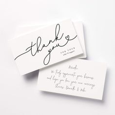 two thank cards with the word thank written in cursive ink on them, sitting next to each other