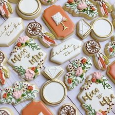 some decorated cookies are laying on a table