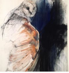 an owl sitting on top of a chair next to a black and white painting with orange accents