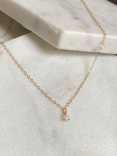 Tiny Opal Necklace-14k Gold Filled Chain-Gold Opal Necklace-Dainty Necklace-Layering Necklace-Opal Jewelry-October Birthstone-Gift~~~~~~~~~~~~~~~~~~~~~~~~~~~~~~~~~~~~~~~~~~~~~~~~~~~~~~~~~~~~~~~~~~~~~~~~~~~~~~~~~~~~~~~~~~~~~~~~~~~~~~~~ITEM DETAILS* * Opal Pendant 3mm* * 14k Gold Filled ChainPicture Size: 14 inches🔔✨🔔 Claim your 10% Coupon by signing up to our mailing list (copy and paste link on URL) https://www.subscribepage.com/pinkslate  🔔✨🔔--SHIPPING DETAILS--*No Invoices are included in Dainty Opal Birthstone Necklaces, Delicate Gold Opal Necklace, Gold Dainty Opal Charm Necklace, Dainty Gold Opal Charm Necklace, Dainty Tiny Opal Jewelry, Tiny Dainty Opal Jewelry, Dainty Opal Clavicle Chain Necklace, Dainty Opal Collar Necklace, Necklace Opal