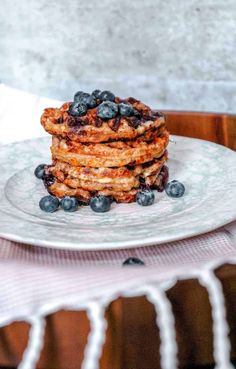 stack of pancakes with blueberries on a plate