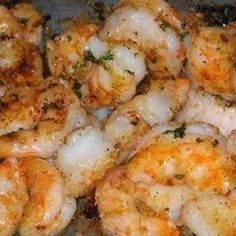 cooked shrimp with parsley and garlic in a skillet ready to be used as an appetizer