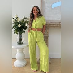 Iconic, Fun, And Flirty Summer Style Introducing The Women's A Tini Summer Set, Featuring A Boxy Cropped Button Down Top In A Vibrant Lime Green. This Top Is Absolutely Iconic And Gorgeous, Combining Fun And Flirty Vibes With A Chic Look. Designed For Ultimate Comfort, It Boasts A Relaxed Fit Made From Extra Soft And Lightweight Fabric. The Delicate Pattern On The Fabric Adds A Touch Of Extra Style, Making It Perfect For Summer. The Top Features A Button-Down Front With A Tie, Offering Versatile Spring Button-up Sets For Day Out, Green Button-up Sets For Summer, Chic Summer Sets With Button Closure, Summer Workwear Sets With Button-up Shape, Summer Workwear Sets With Button-up, Summer Workwear Button-up Sets, Chic Short Sleeve Green Set, Chic Green Short Sleeve Set, Green Button-up Set For Spring