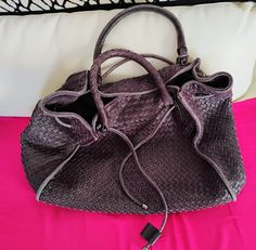 a wonderful BOTTEGA VENETA purple woven lambskin parachute bag, now discontinued and rare to find! it is authentic made in Italy probable year of release 2010 about 14 inches (length) by 14 inches (height) pre-owned and loved used with care in great condition soft lambskin  beautiful purple color great for daily use and travelling thank you for your visit! Parachute Bag, Weave Bag, Purple Weave, Tiktok Fashion, Lavender Bags, Big Bag, Big Bags, Woven Bag, Purple Color