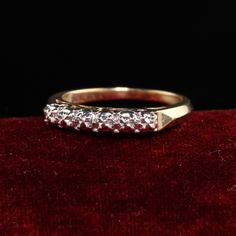 Beautiful Retro Estate 14K Yellow Gold Diamond Cut Wedding Band - Size 5. This beautiful band has diamond cut engravings on the top of the band which gives the sparkle and illusion of diamonds being set. Item #R0946 Metal: 14K Yellow Gold Weight: 2.2 Grams Ring Size: 5 Measurements: Top measures 2.84 mm wide and band measures 1.62 mm wide. Measurement from finger to top of ring: 3.87 mm Layaway: For your convenience, we will be happy to provide layaway payment options. Please contact us to work 1920s Engagement Ring, Emerald Eternity Band, Diamond Half Eternity Band, Watch Cufflinks, Wedding Band Engraving, Antique Wedding Rings, Antique Wedding, Half Eternity Band, Antique Diamond