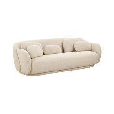 a white couch with pillows on it