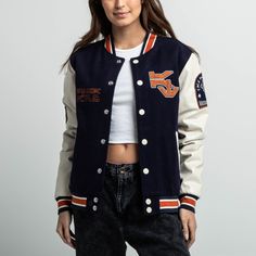 Stand with one of the greatest Jedi to ever come out of the order with our new and stylish varsity jacket. Features - chenille patches, embroidery, AND screen print. Lining: 100% polyester Body: 50% wool, 50% polyester Trimming: 95% cotton, 5% spandex Sleeves: faux leather Full snap-up front closure Front pockets Striped ribbed cuffs, collar, and hem Imported Officially licensed Star Wars merchandise Brianna is wearing a small varsity jacket. Girlfriend Things, Couple Dresses, Senior Jackets, Varsity Jacket Outfit, Varsity Jacket Women, College Jackets, Formal Wear Women, Stylish Hoodies, Ladies Blazer