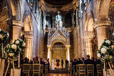 a couple getting married in an old church