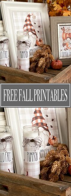 two wooden boxes filled with fall printables on top of a shelf next to autumn leaves