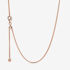 No jewellery collection is complete without a simple versatile necklace that can be worn by itself or accessorised with your favourite pendants. One of the most essential pieces for any wardrobe, our 14k rose gold-plated Curb Chain Necklace features a sliding clasp, flat interlocking chain links and a dangling curb chain. Wear the slider necklace on its own or layer it for a fashion-forward look and adjust to suit your desired length. Pandora Curb Chain Necklace - Size 23.6 In | Gold | 388283-60 Slider Necklace, Pandora Necklace, Bracelet Pandora, Curb Chain Necklace, Necklace Clasps, Jewellery Uk, Chain Links, Adjustable Necklace, Rose Gold Necklace