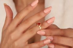 Carnelian Stone Gold Ring, Delicate Womens Red Carnelian Rings, Natural Carnelian Gemstone Silver Rings, Everyday Rings, Gold Filled Ring > Gemstone - Carnelian > Gemstone Shape - Oval > Gemstone Size - 6 X 8 mm > Metal - Gold / Rose Gold / Sterling Silver > Metal finish - Smooth Shiny ABOUT Carnelian ♥ Purification ♥ Serenity ♥ Protection ♥ Wisdom ♥ Balance ♥ Strength ♥ Friendship ♥ Love ♥ Positive thinking ♥ Sensitivity Carnelian is a purification stone. It dispels negative energy and can be w Red Carnelian Ring As A Gift, Red Moonstone Gemstone Ring As Gift, Red Moonstone Gemstone Ring For A Gift, Red Moonstone Ring For Anniversary, Red Moonstone Anniversary Ring, Red Carnelian Wedding Rings, Red Gemstone Enamel Ring Gift, Oval Red Moonstone Ring Gift, Red Enamel Gemstone Ring For Gift