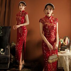 Looking for a quintessential Chinese garment for your wedding, tea ceremony, or any other momentous event? The qipao/cheongsam is expertly crafted from supple velvet and adorned with delicate floral sequins. With its elegant capped sleeves and mandarin collar, this ankle-length dress exudes sophistication, making it ideal for formal gatherings. The zipper back and lining underneath provide both comfort and a flawless fit. Size Guide: Please refer to the size guide picture before placing the orde Qipao Vintage, Chinese Prom Dress, Red Chinese Dress, Button Dresses, Phoenix Tail, Qipao Pattern, Red Qipao, Chinese Qipao, Modern Qipao