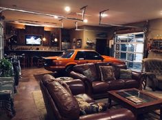 a living room filled with furniture and a car