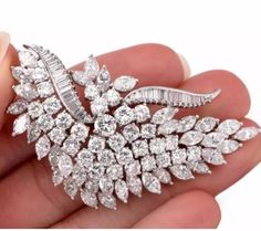 Specification:- *Diamond Material : Cubic Zirconia  *Diamond Cut : Round Marquise & Baguette  Cut *Total Diamond Weight : 16.08 CT (Approx.) *Diamond Dimension : 3.60, 4.00, 5.00, 1.5*1, 6*3 MM *Diamond Color : White *Diamond Clarity : VVS *Length : 60.00 MM *Making Process: Handmade by our Experienced Staff. *Stamp: Our All Brooch Stamped According to metal Purity (925 SIL/10K/14K/18K). Custom Order:- *We do Accept Custom order. *Buyer can also request customization in listed Items (Charges app White Brilliant Cut Brooches For Wedding, White Brilliant Cut Wedding Brooches, Luxury Diamond White Brooches For Wedding, White Diamond Wedding Brooches, Luxury Diamond Brooches For Party, Brooch Wedding, Dream Gift, Wedding Anniversary Gift, 925 Silver Jewelry