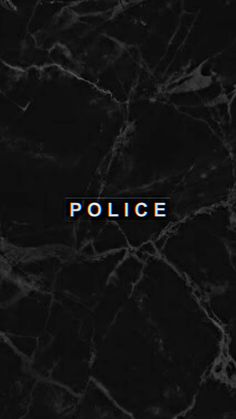 the word police on a black marble background