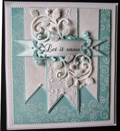 a card that says let it snow with an ornate design on the front and bottom