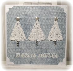 three white christmas trees on a blue background with the words horsch north written below them