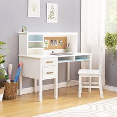 a child's desk and chair in a room