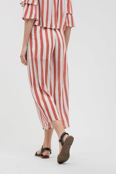 Details: 100% Rayon Lined on top Elastic waist Chic Striped Bottoms With Elastic Waistband, Striped Stretch Pants For Summer, Chic Striped Wide Leg Pants For Beach, Striped Long Pants For Summer, Casual Striped Ankle-length Pants, Spring Striped Beach Pants, Beach Striped Wide-leg Pants, Spring Striped Ankle-length Bottoms, Striped Wide-leg Beach Bottoms