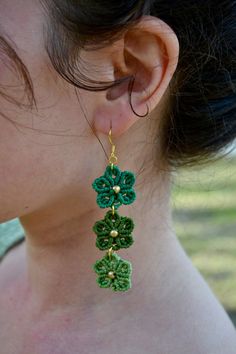 ✺✳ Macrame Stacked Flower Earrings ✳✺ Springtime but make it an earring. These are boho chic to the nines.  * Product Details * Triple stacked macrame flowers with hypoallergenic hooks! This pair of earrings is made with colors ' emerald ', ' olive ', and ' mint '. ★ Brass Earth ★ This jewelry is handmade by myself and inspired by my time living in India. All materials are sourced from the friend who taught me this craft 8 years ago! Each piece is woven with intention and love. Green Macrame Earrings As A Gift, Green Macrame Earrings For Gift, Green Macrame Dangle Earrings, Macrame Flowers, Earrings Macrame, Beach Flowers, Jewelry Beach, Hippie Earrings, Handmade Flower