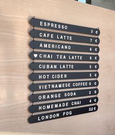 a sign that says espresso cafe latte americano chuan tea latte hot cider vietnamese coffee orange soda london foo