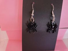 Black spider earrings. Silver-plated hooks with rubber backs. Black Drop Earrings For Halloween, Black Drop Earrings With French Hook, Spider Earrings, Black Spider, Earrings Silver, Jewelry Earrings Dangle, Etsy Earrings, Silver Plated, Beauty Book