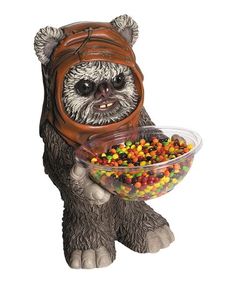 a star wars chew chew bear holding a bowl of candy and gummy bears in it's paws